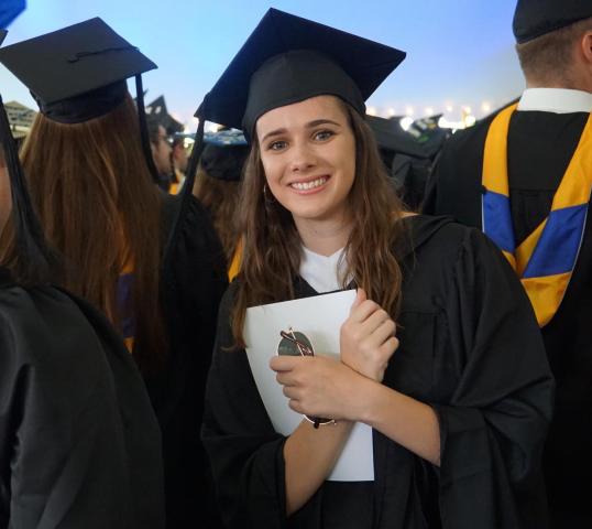 student at commencement pictured