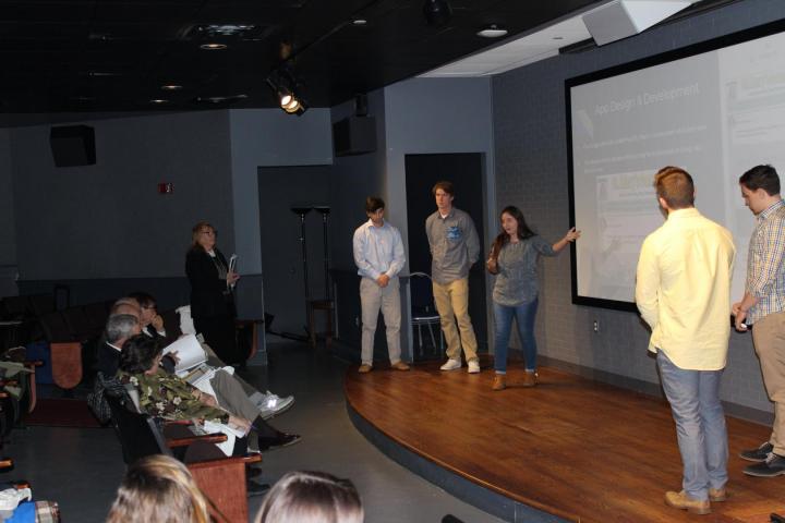 students present to judges "Shark Tank" style