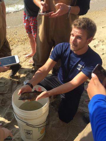 Isaac Hersh '19 with a summer flounder