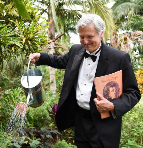 Brian Ganz pictured with a watering can