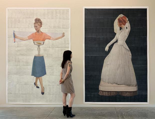 Johnson's Visible Bride art hanging with onlookers.