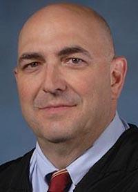 Honorable Daniel A. Friedman pictured