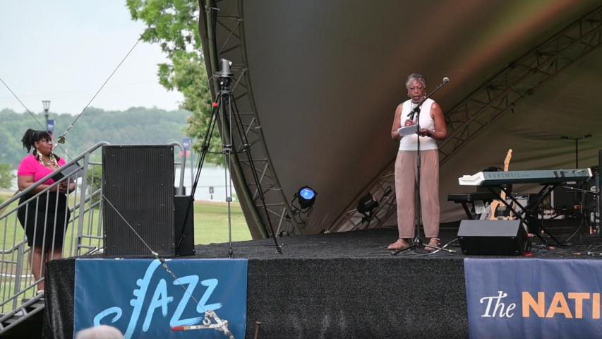 President Jordan introducing "DC's Queen of the Blues" Carly Harvey ’07