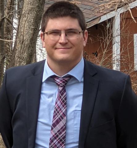assistant professor Josh Kaisen