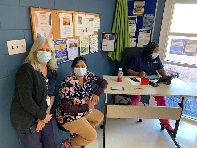 Health department staff pictured in wellness center lobby
