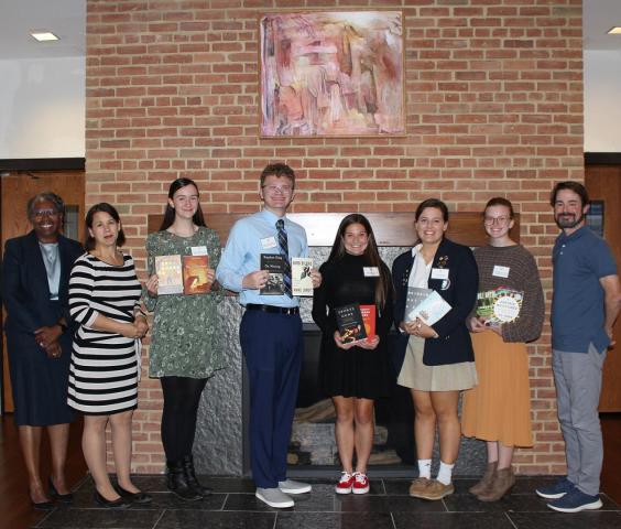 Shown in photo from left: SMCM President Tuajuanda C. Jordan; Angie Draheim (SMCM psychology department staff and Zeta Chapter secretary); Alexandria Stevens (King’s Christian Academy); Mikah Mohun-Hintze (Leonardtown High School); Angelena Holmes (Chopticon High School); Erika Gensley (St. Mary’s Ryken High School); Kathleen O’Toole (Great Mills High School); Colby Nelson (senior lecturer of English at SMCM and Zeta Chapter book award coordinator).