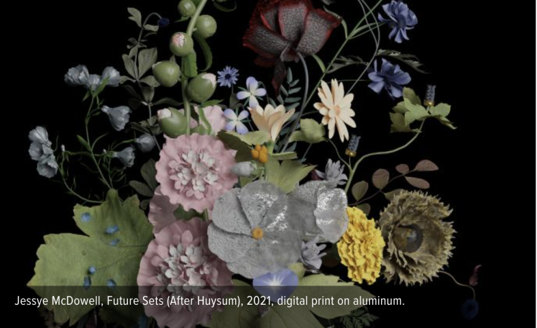 fake flowers against a black background.