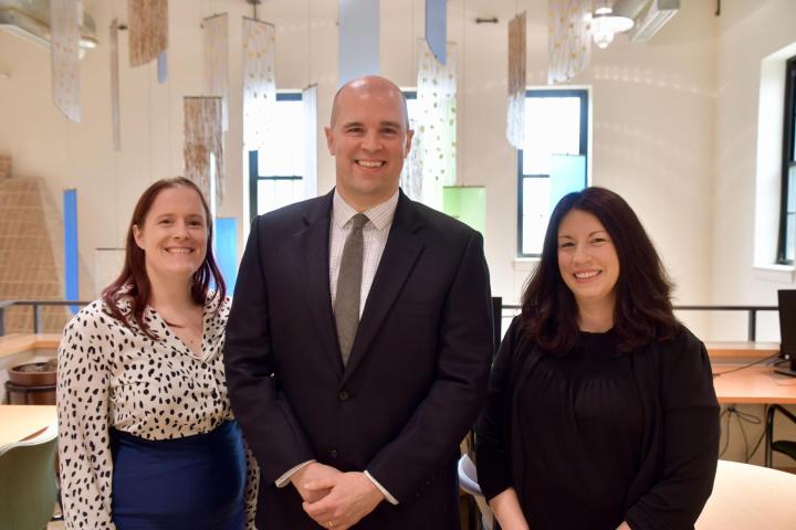 Meghan Druzgala, Michael Dunn and Julianne Petrilla stand for a photo outside of the Center for Career and Professional Development offices