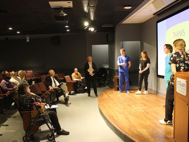 Osborne with River Center Urgent Clinic team and judges