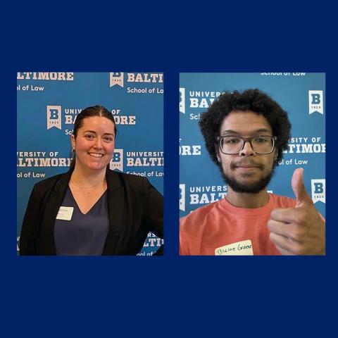 Two individuals pose in front of a blue University of Baltimore School of Law backdrop; one smiles, the other gives a thumbs up.