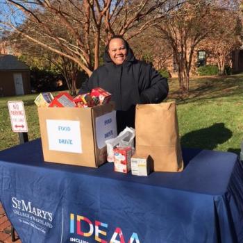 An SMCM staff member collects food donations
